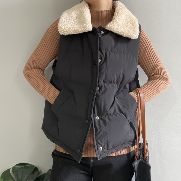 Sügis-talvine vest nööpide ja sulekraega