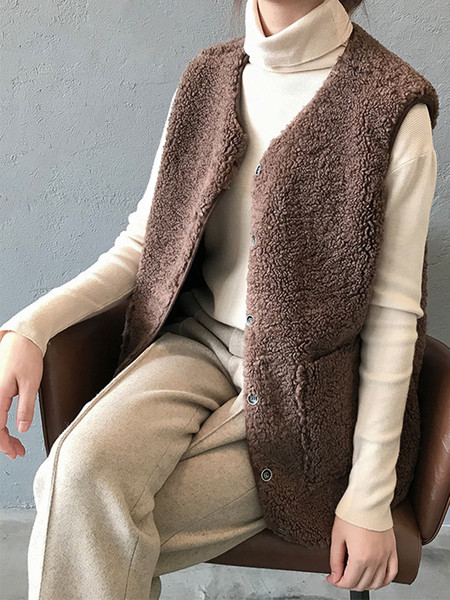 Naiste sulevest nööpide ja taskuga