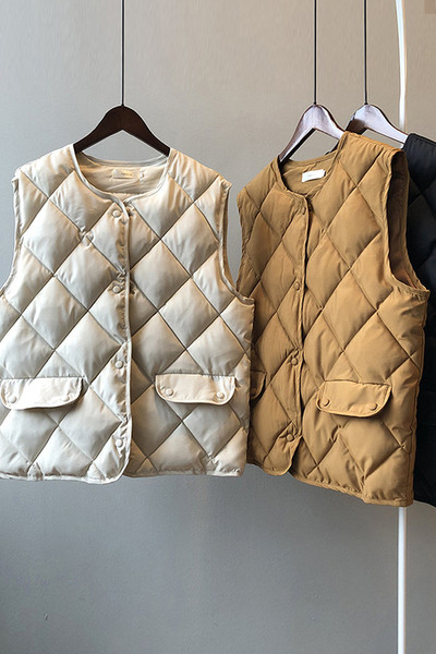 Jesenski ženski prsluk s gumbima