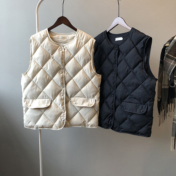 Jesenski ženski prsluk s gumbima