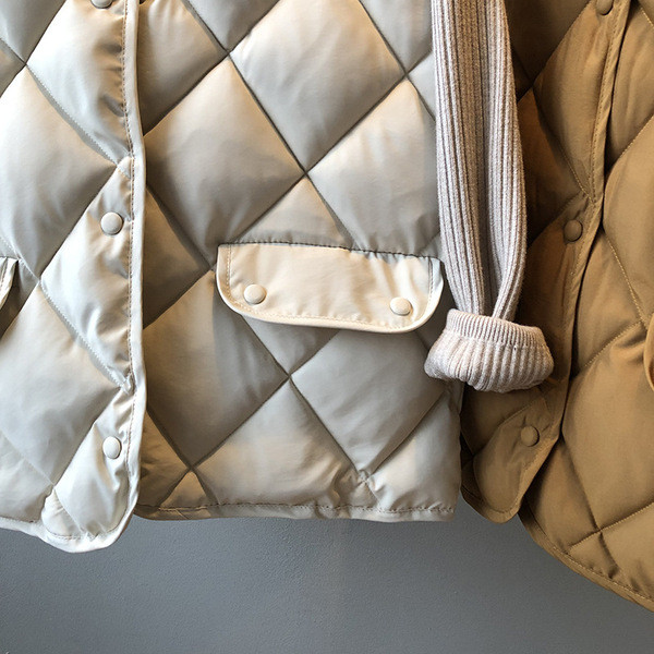 Jesenski ženski prsluk s gumbima