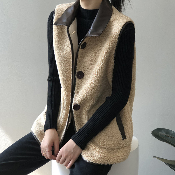 Γιλέκο με κουμπιά και τσέπες