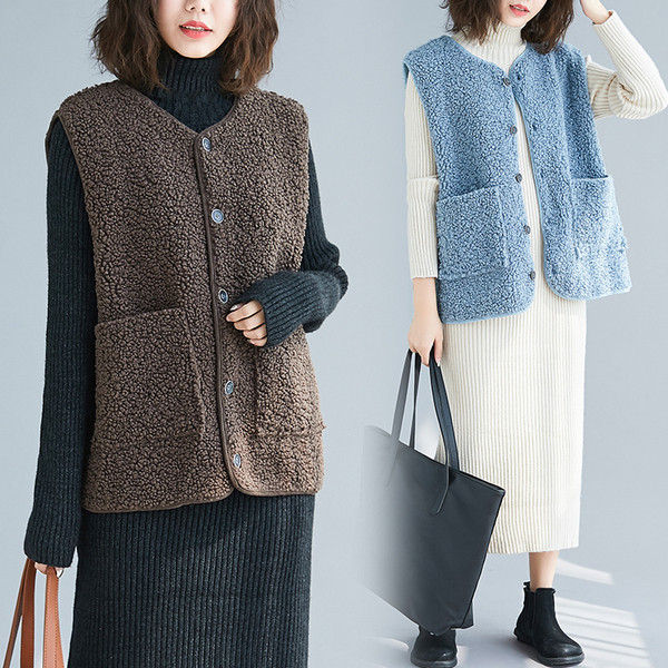 Uus mudel taskute ja spitsikaelusega naistevest