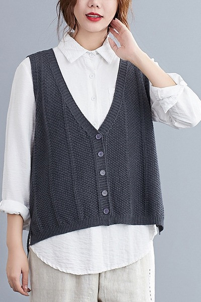 Moderan ženski pleteni prsluk sa dubokim dekolteom