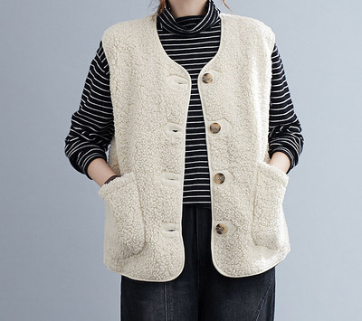 Naiste valge sulevest nööpide ja spitsikaelusega