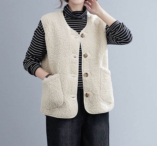 Naiste valge sulevest nööpide ja spitsikaelusega