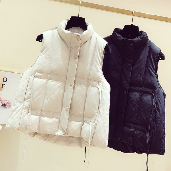 Asümmeetriline naiste vest polo kraega - lai mudel