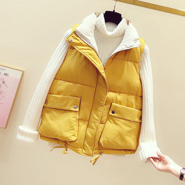 Jesensko-zimski ženski prsluk s velikim džepovima