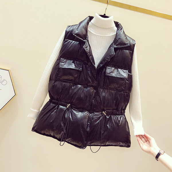 Moodne naiste läikiv vest taskute ja elastse vöökohaga