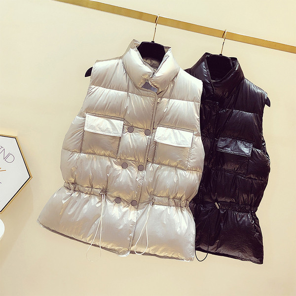 Moodne naiste läikiv vest taskute ja elastse vöökohaga