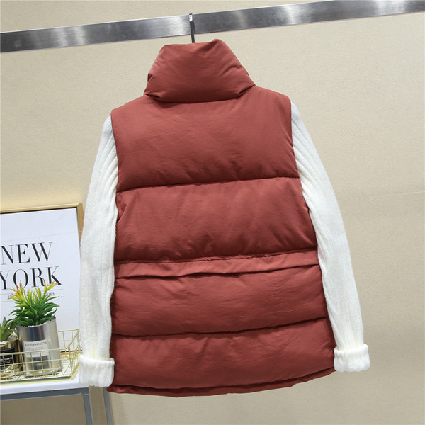 Laia mudeliga naiste vest kõrge krae ja nööpidega