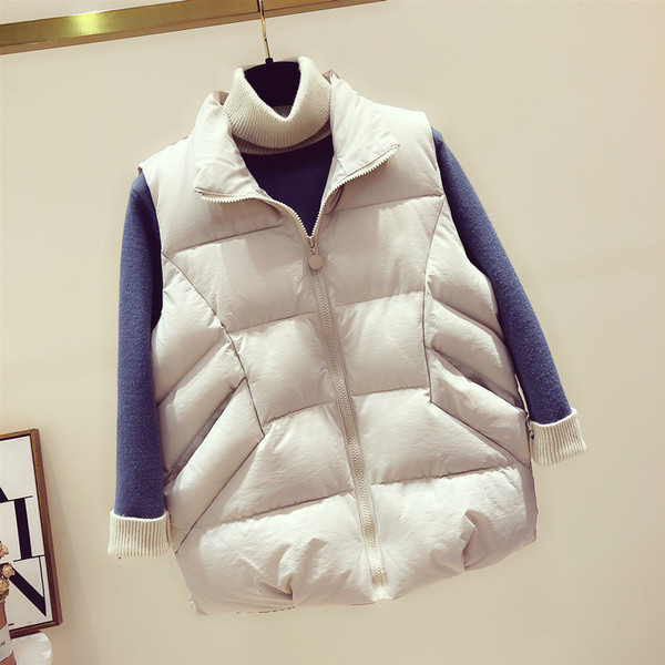 Uus kõrge krae ja taskutega igapäevase naistevesti mudel