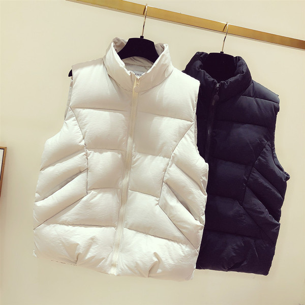 Uus kõrge krae ja taskutega igapäevase naistevesti mudel