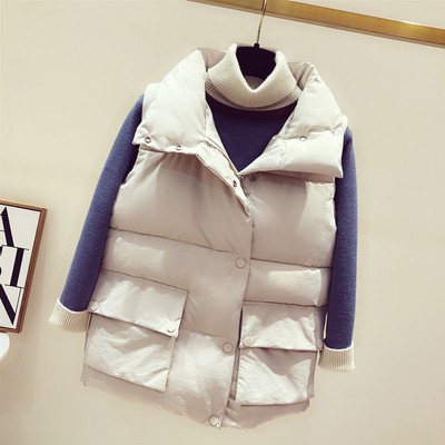 Sügis-talvine naiste vest taskute ja tikanditega