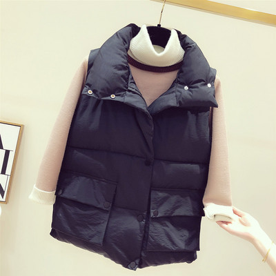 Sügis-talvine naiste vest taskute ja tikanditega