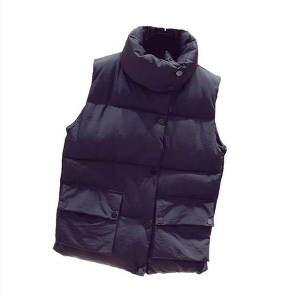 Sügis-talvine naiste vest taskute ja tikanditega