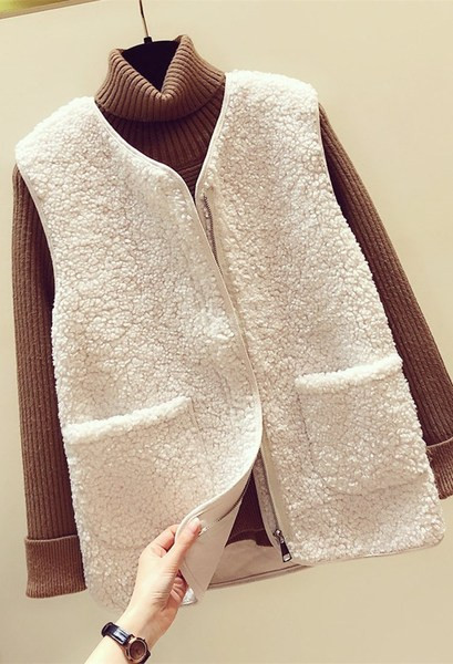 Γυναικείο χειμερινό γούνινο γιλέκο με τσέπες