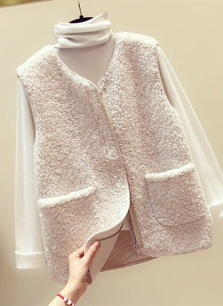 Γυναικείο χειμερινό γούνινο γιλέκο με τσέπες