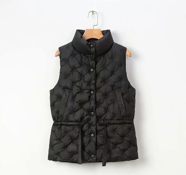 Moteriška liemenė su raišteliais ties juosmeniu