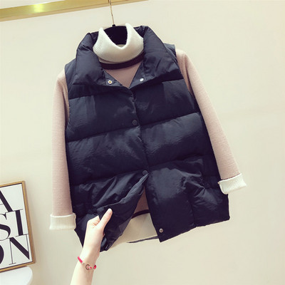 Naiste moodne nööpide ja kõrge kraega vest