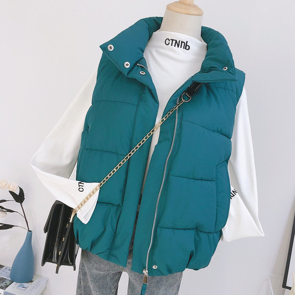 Naujas moteriškos vilnos liemenės modelis su kišenėmis