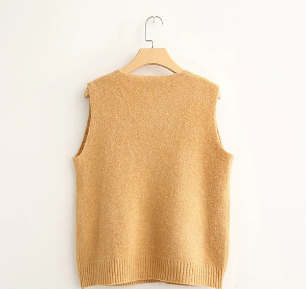 Kootud naiste vest spits-kaelusega