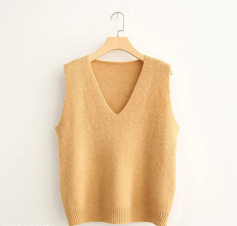 Kootud naiste vest spits-kaelusega