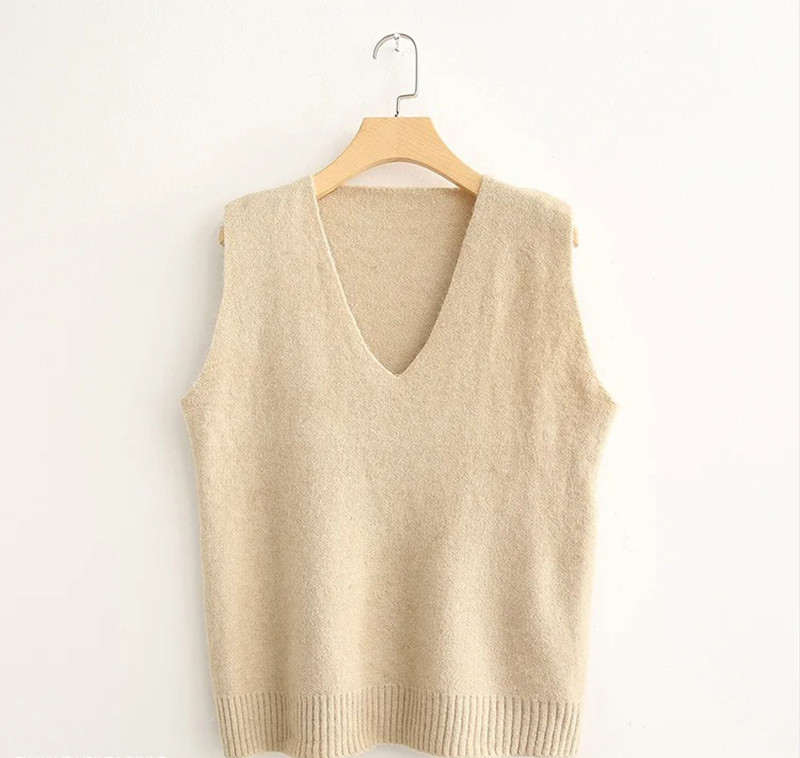 Kootud naiste vest spits-kaelusega