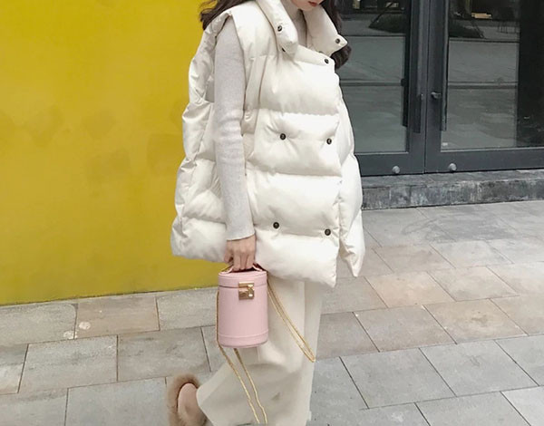 Naiste talvevest nööpide ja kõrge kraega