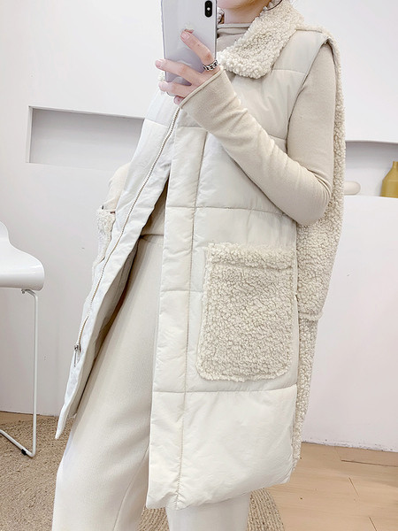 Novi model dugog ženskog prsluka sa klasičnom kragnom i džepovima