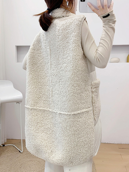 Novi model dugog ženskog prsluka sa klasičnom kragnom i džepovima