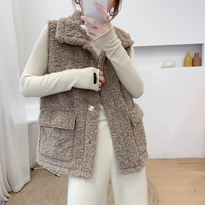 Naiste klassikalise krae ja taskutega sulevest