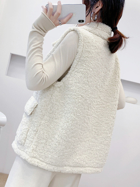 Naiste klassikalise krae ja taskutega sulevest