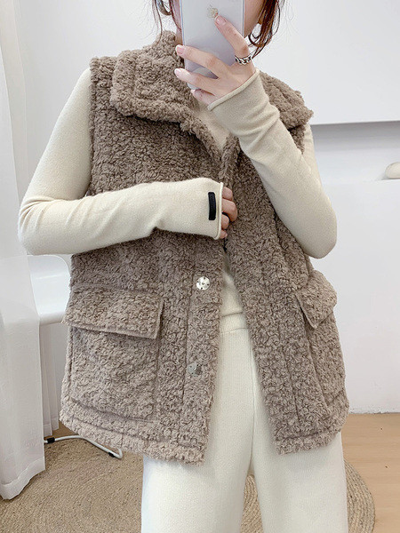 Naiste klassikalise krae ja taskutega sulevest