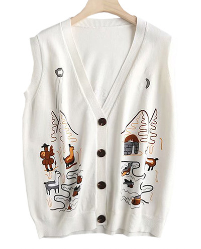 Moteriška megzta liemenė su aplikacijomis ir sagomis