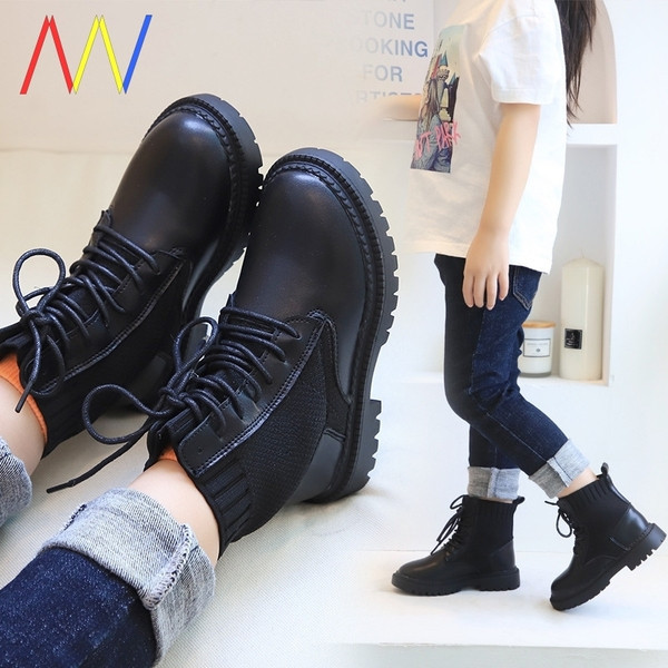 Öko-nahast ja tekstiilist paeltega laste kaasaegsed saapad