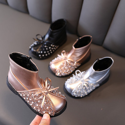 Μοντέρνες παιδικές μπότες για κορίτσια με διακοσμιτικές πέτρες και κορδέλα