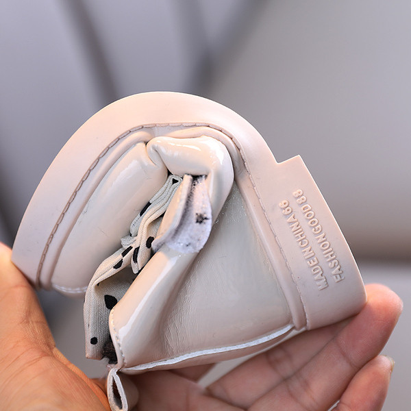 Παιδικές μπότες  από οικολογικό δέρμα με κορδέλα πουά