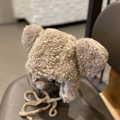 Bolyhos női téli fülvédő nyakkendővel