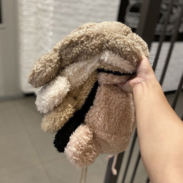 Bolyhos női téli fülvédő nyakkendővel