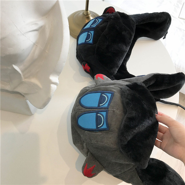 Süllyes sapka típusú, uniszex fülvédős modell