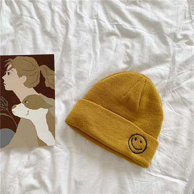 Πλεκτό καπέλο με κέντημα