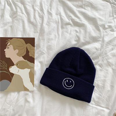 Πλεκτό καπέλο με κέντημα