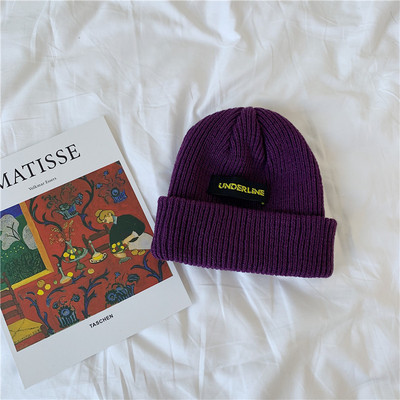 Ženska jesensko-zimska kapa s vezom