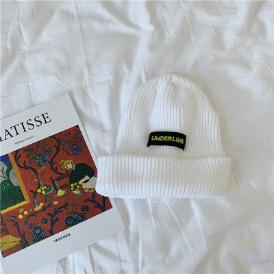 Ženska jesensko-zimska kapa s vezom