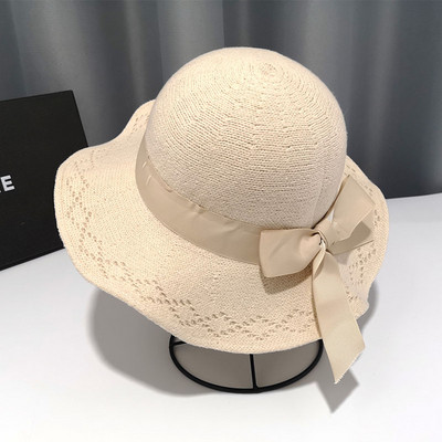 Kötött alkalmi női sapka szalaggal