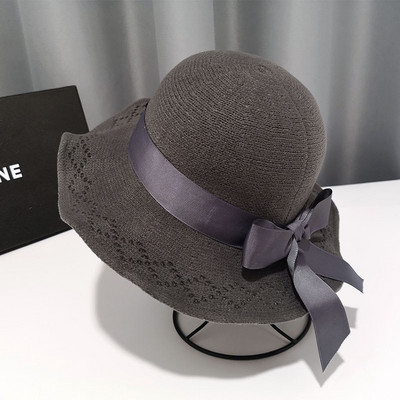 Kötött alkalmi női sapka szalaggal