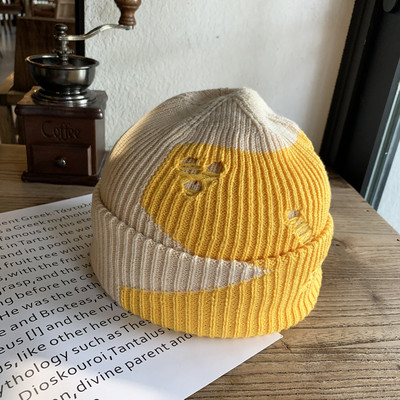 Γυναικείο πλεκτό καπέλο με σκισμένα μοτίβα