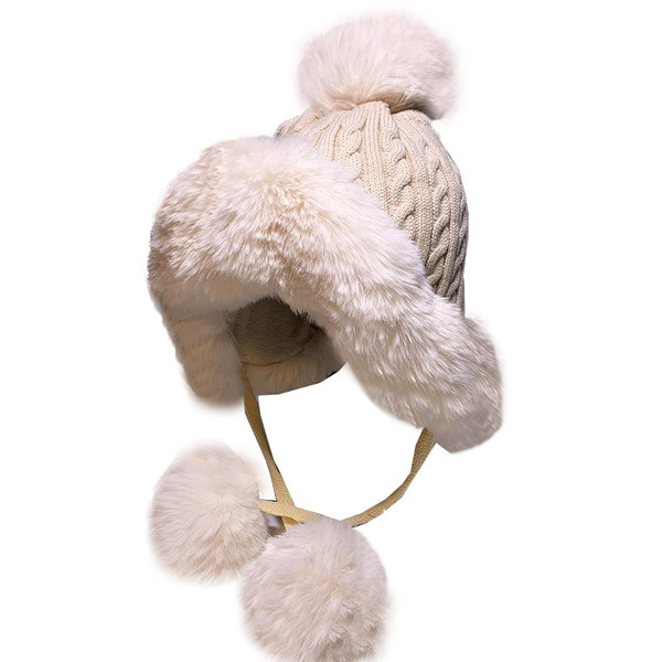 Női téli kötött sapka tollal és nyakkendővel