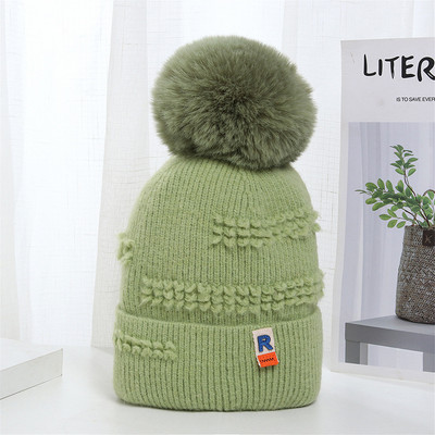 Γυναικείο πλεκτό καπέλο με φούντα